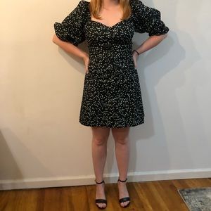 Size 8 black mini dress with blue and white circle detail.